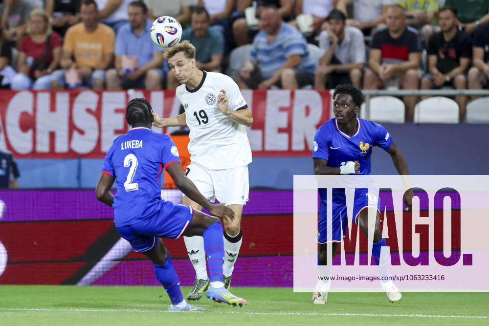 Castello Lukeba France , Nelson Weiper Germany and Soungoutou Magassa France battle for the ball, UEFA European Under 21 Championship 2025 Semi Final, Germany v France, Koöice futbalova arà na on June 25, 2025 in Koöice, Slovakia Photo by Marco Steinbrenner DeFodi Images Castello Lukeba France , Nelson Weiper Germany and Soungoutou Magassa France battle for the ball, UEFA European Under 21 Championship 2025 Semi Final, Germany v France, Koöice futbalova arà na, June 25, 2025 in Koöice, Slovakia Photo by Marco Steinbrenner DeFodi Images