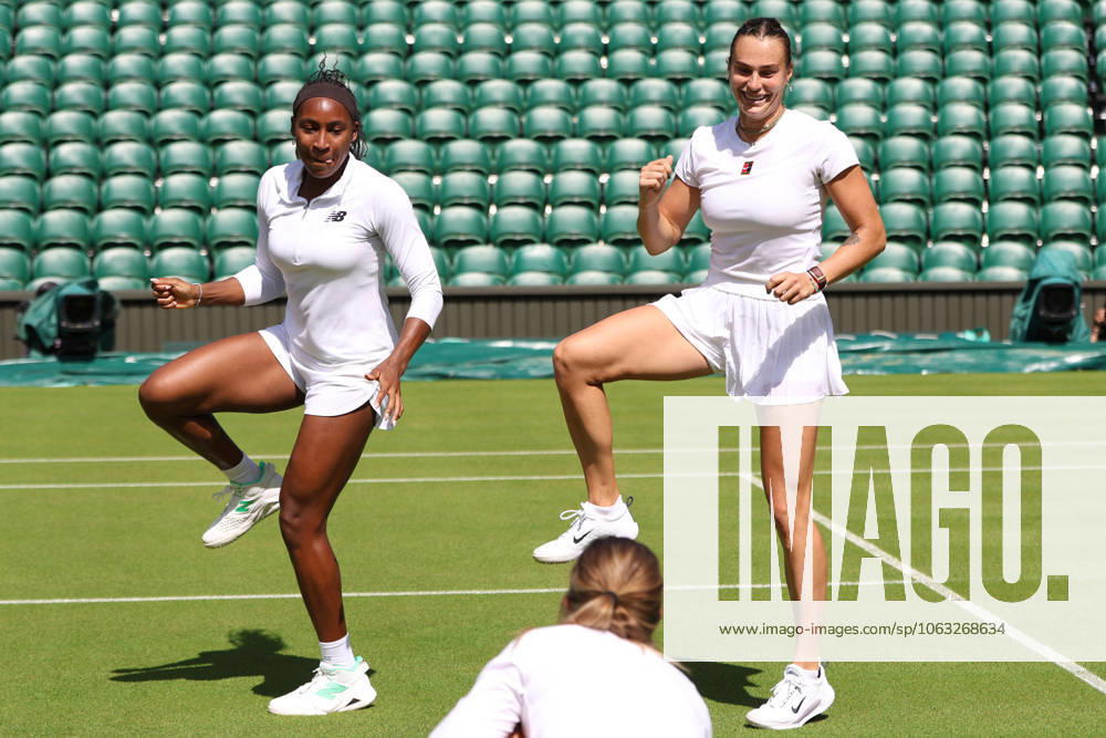 COCO GAUFF of USA and ARYNA SABALENKA during dancing after the practice session before Championships 2025 at Wimbledon AELTC in London. London England - ZUMAc278 20250627_zsp_c278_004