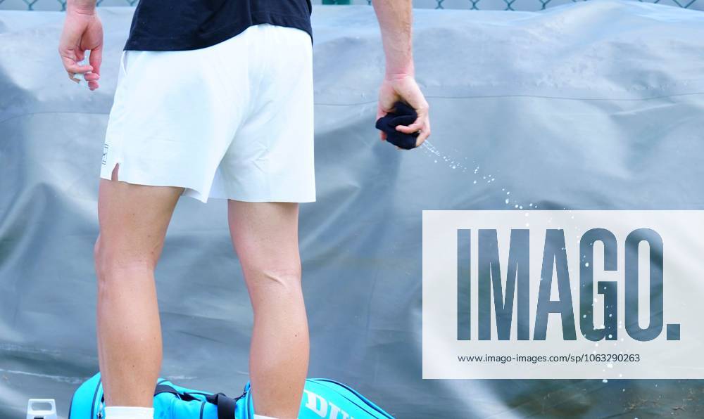 Jack Draper wrings his wristband out after his first practice session of the day Wimbledon Tennis Championships, Saturday Practice, The All England Lawn Tennis and Croquet Club, London, UK - 28 Jun 2025London The All England Lawn Tennis and United Kingdom