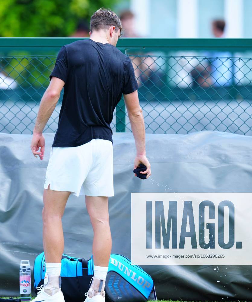 Jack Draper wrings his wristband out after his first practice session of the day Wimbledon Tennis Championships, Saturday Practice, The All England Lawn Tennis and Croquet Club, London, UK - 28 Jun 2025London The All England Lawn Tennis and United Kingdom
