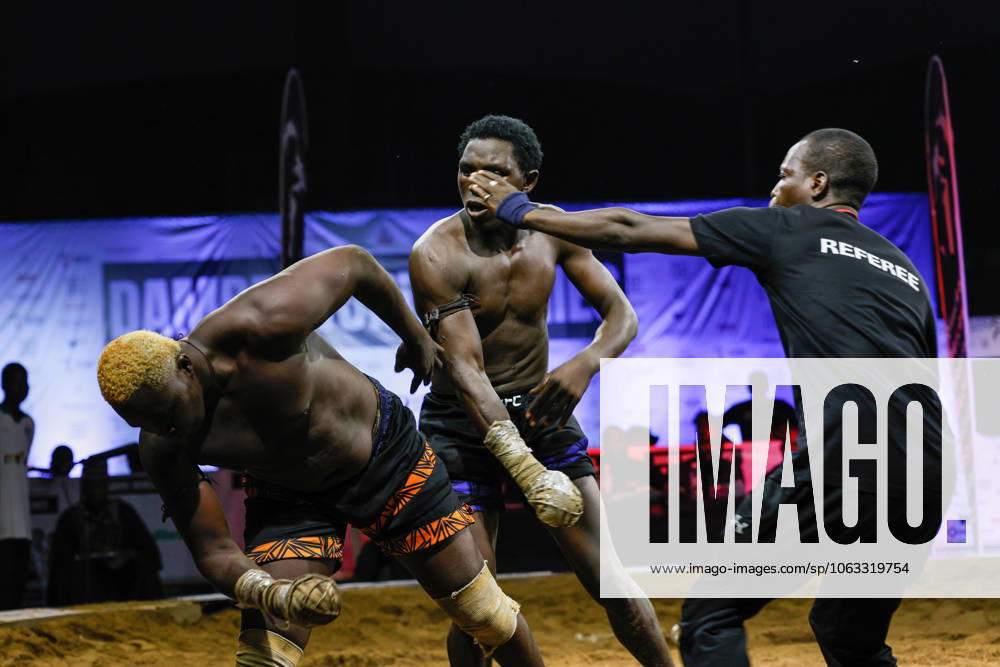 Bilder des Jahres 2025, Sport 06 Juni African Warrior Dambe World Series championship in Nigeria ABUJA, NIGERIA - JUNE 28: Dambe fighters compete during the African Warrior Dambe World Series championship in Abuja, Nigeria on June 28, 2025. Dambe fighting, traditionally performed by the Hausa people living in the north of Nigeria, is known as a fierce fighting style in which one hand is used as a spear and the other hand as a shield . Emmanuel Osodi Anadolu Abuja Nigeria. Editorial use only. Please get in touch for any other usage.