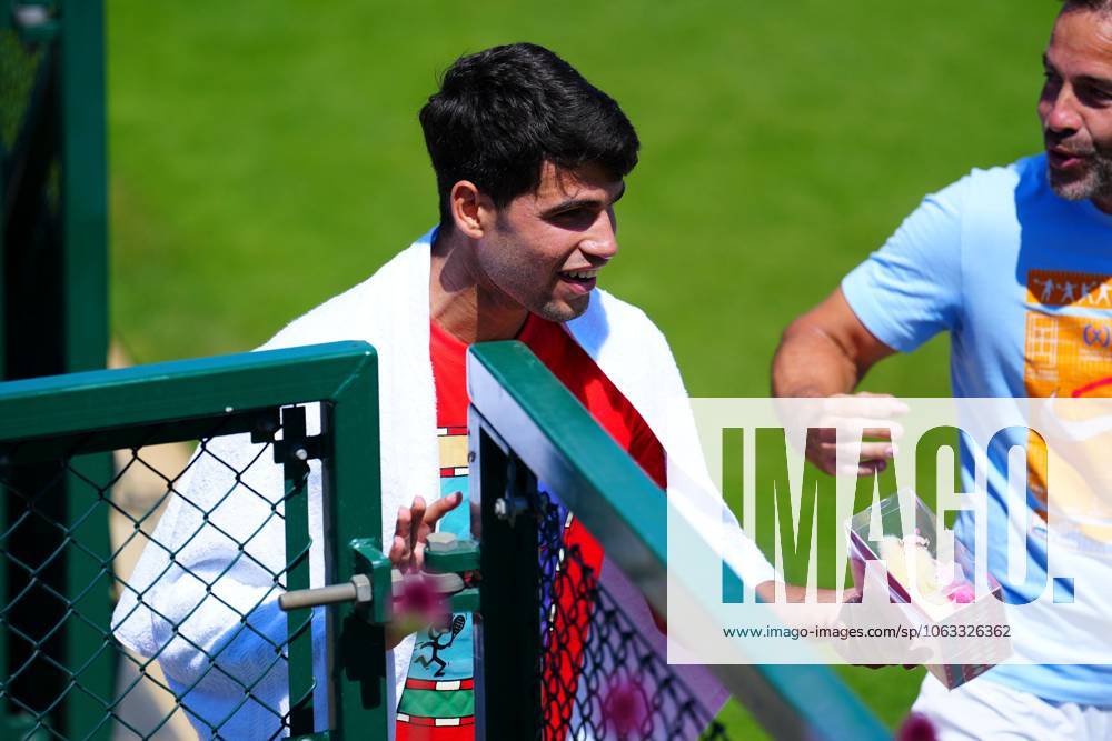 Carlos Alcaraz is handed a Labubu doll in a box after practice Wimbledon Tennis Championships, Sunday Practice, The All England Lawn Tennis and Croquet Club, London, UK - 29 Jun 2025London The All England Lawn Tennis and United Kingdom