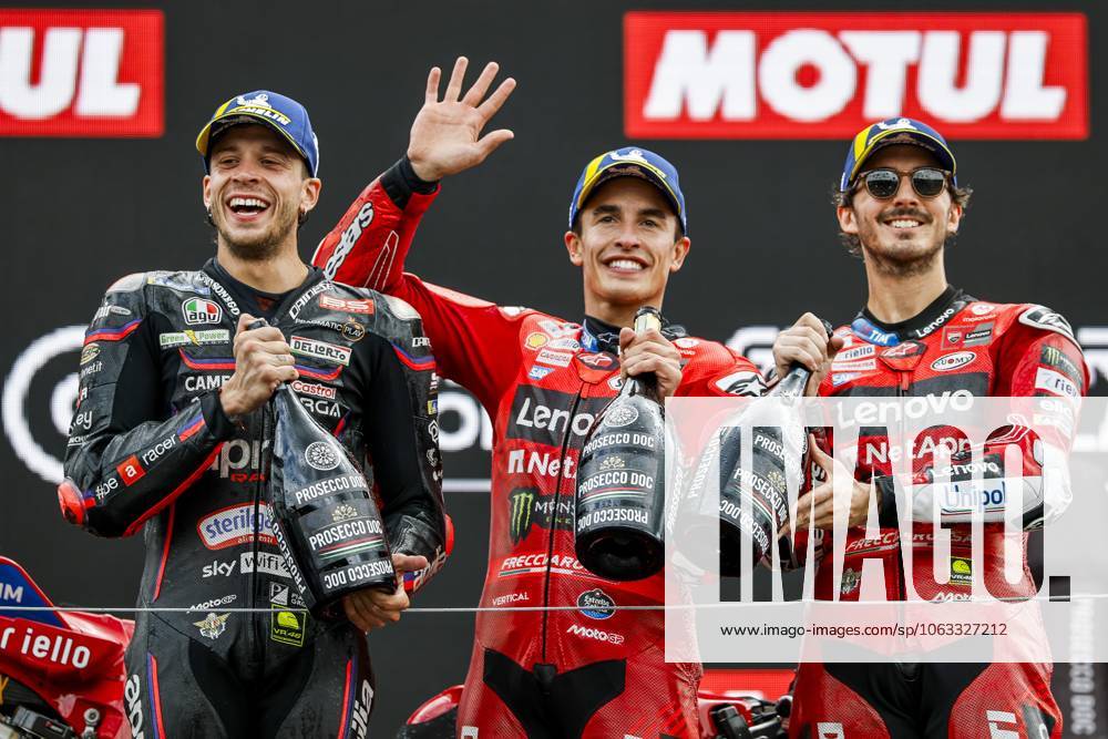 KW26 ASSEN - (l-r) Marco Bezzecchi (ITA), Marc Marquez (SPA), Francesco Bagnaia (ITA) on the podium after the MotoGP race at the 100th Edition of the TT of Assen. ANP VINCENT JANNINK ANPxSportx IVx 530684312 originalFilename: 530684312