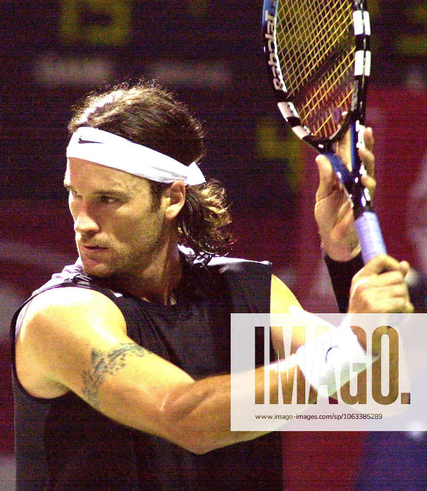 Jan 08, 2005; Madras, INDIA; Spain s Carlos Moya hits a ball against his countrymate Guillermo Garcia-Lopez, in a semifinal match of the ATP, Tennis Herren Chennai Open in Madras on January 8, 2005. Moya won the match. Madras INDIA