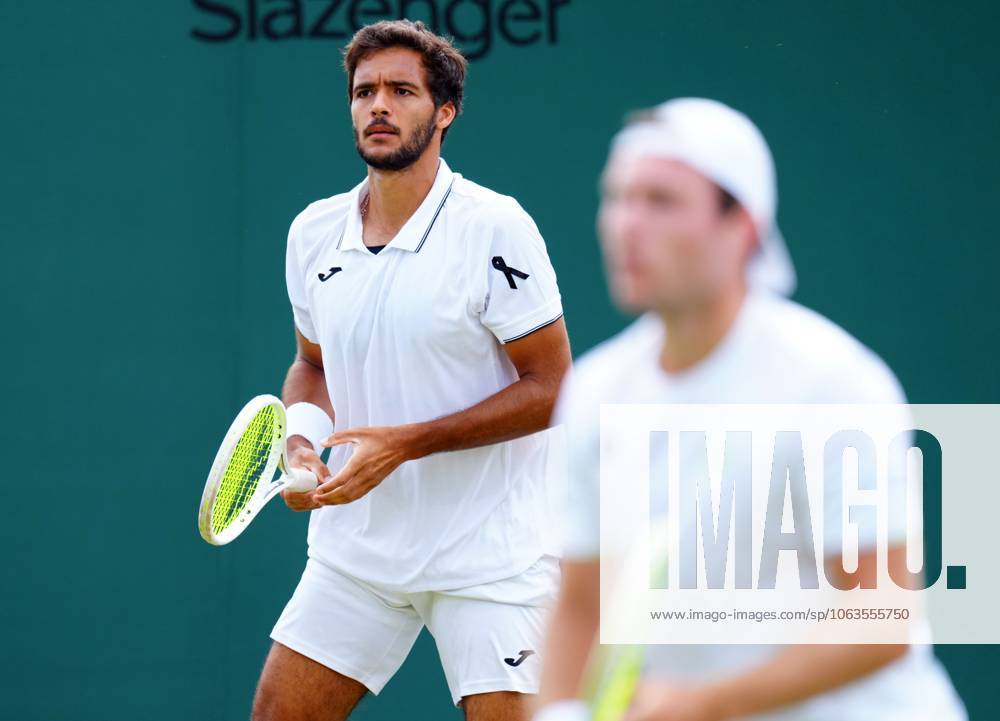 Francisco Cabral of Portugal wearing a black ribbon for Diogo Jota, during his Men s Doubles second round match Wimbledon Tennis Championships, Day 5, The All England Lawn Tennis and Croquet Club, London, UK - 04 Jul 2025London The All England Lawn Tennis and United Kingdom