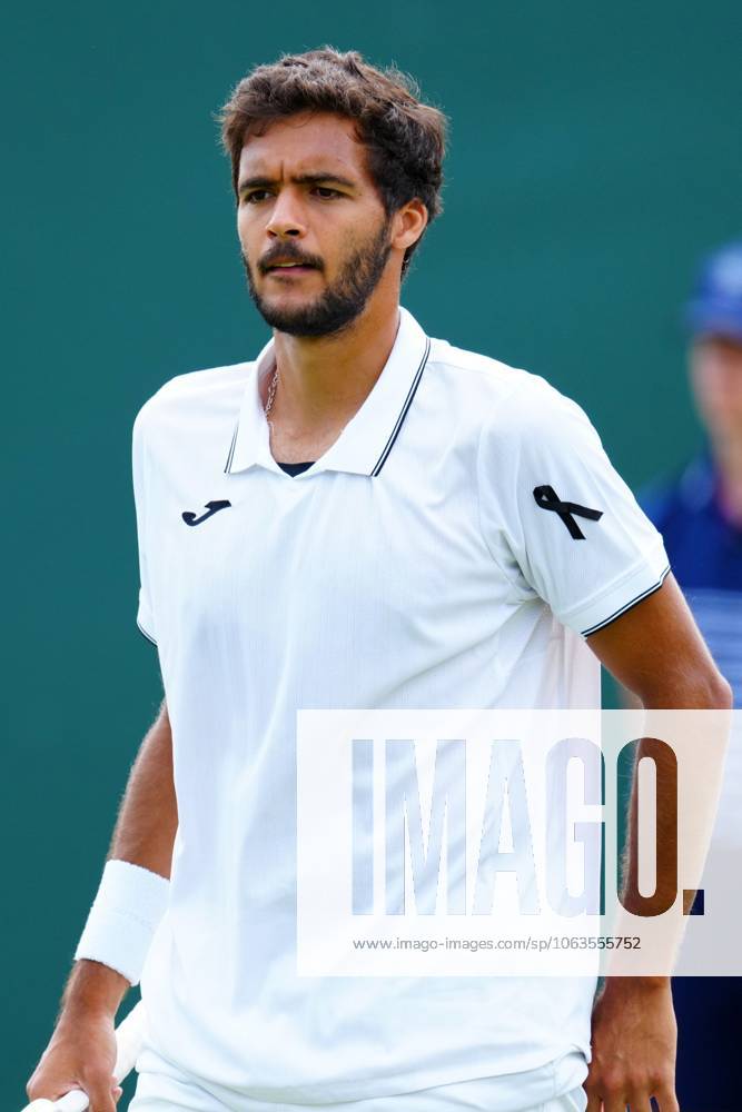 Francisco Cabral of Portugal wearing a black ribbon for Diogo Jota, during his Men s Doubles second round match Wimbledon Tennis Championships, Day 5, The All England Lawn Tennis and Croquet Club, London, UK - 04 Jul 2025London The All England Lawn Tennis and United Kingdom