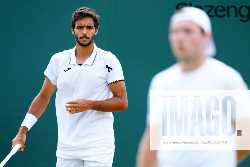 Francisco Cabral of Portugal wearing a black ribbon for Diogo Jota, during his Men s Doubles second round match Wimbledon Tennis Championships, Day 5, The All England Lawn Tennis and Croquet Club, London, UK - 04 Jul 2025London The All England Lawn Tennis and United Kingdom