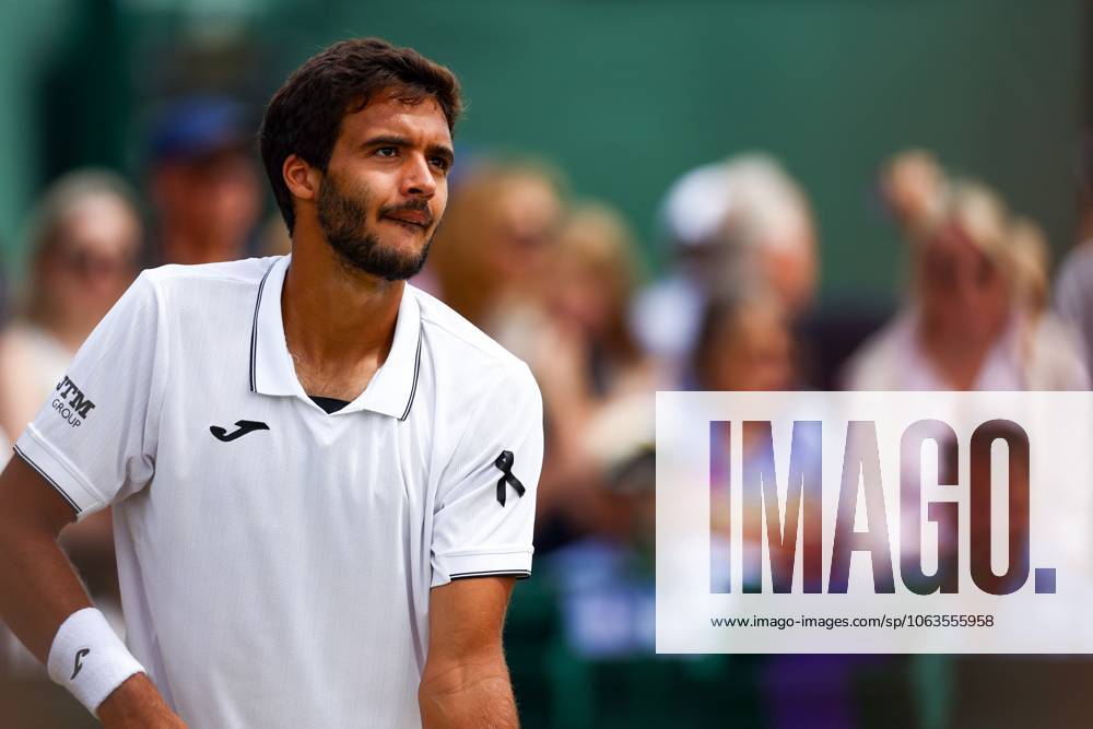 Francisco Cabral of Portugal wearing a black ribbon for Diogo Jota, during his Men s Doubles second round match Wimbledon Tennis Championships, Day 5, The All England Lawn Tennis and Croquet Club, London, UK - 04 Jul 2025London The All England Lawn Tennis and United Kingdom