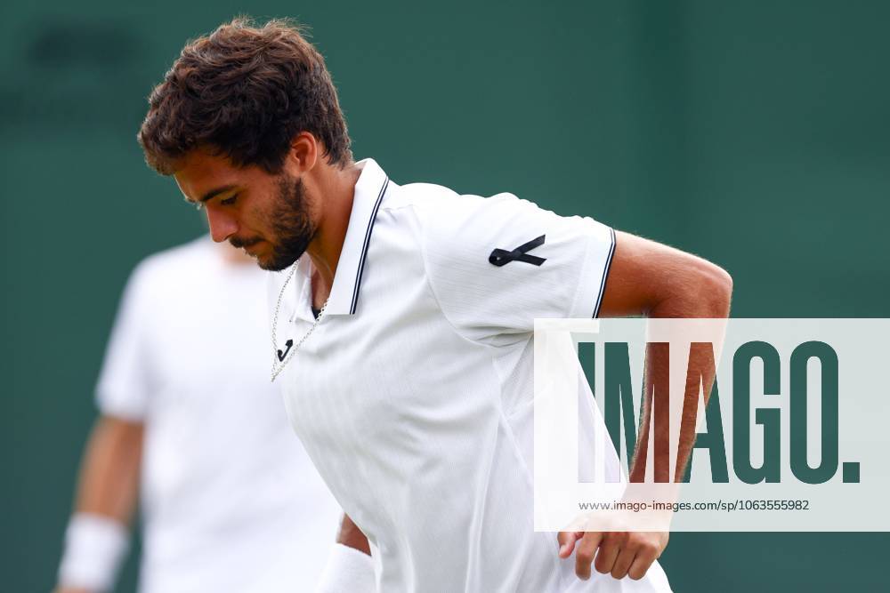Francisco Cabral of Portugal wearing a black ribbon for Diogo Jota, during his Men s Doubles second round match Wimbledon Tennis Championships, Day 5, The All England Lawn Tennis and Croquet Club, London, UK - 04 Jul 2025London The All England Lawn Tennis and United Kingdom