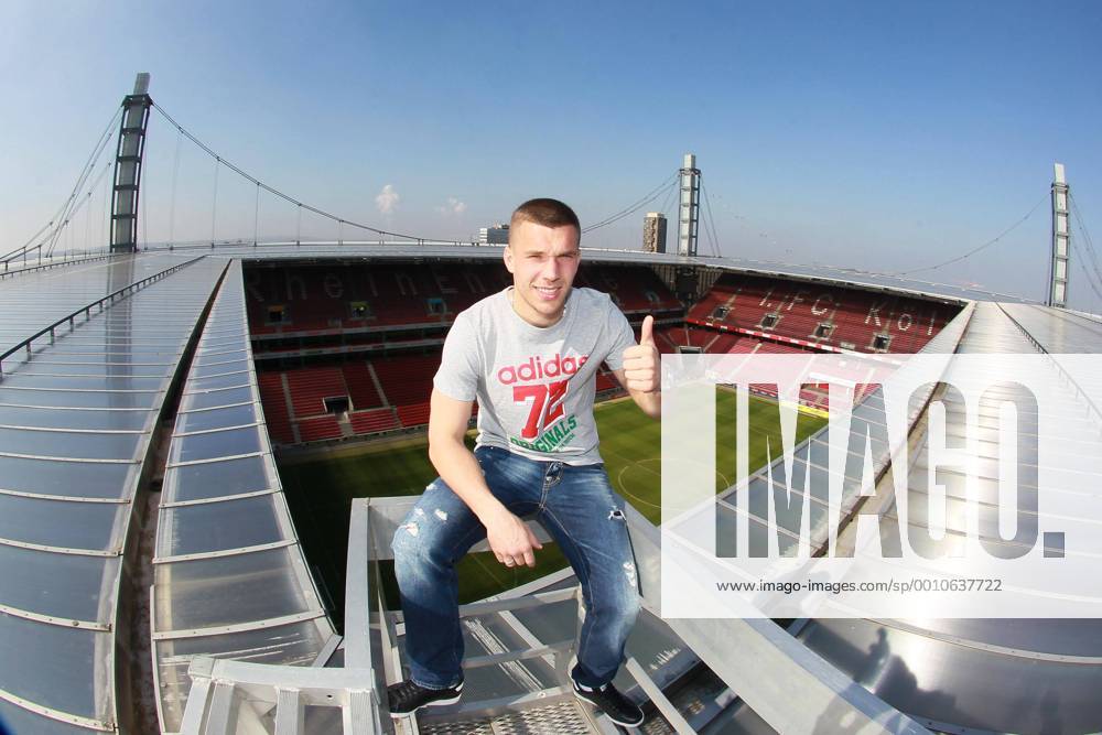 1.FC Köln Lukas Podolski auf dem Stadiondach