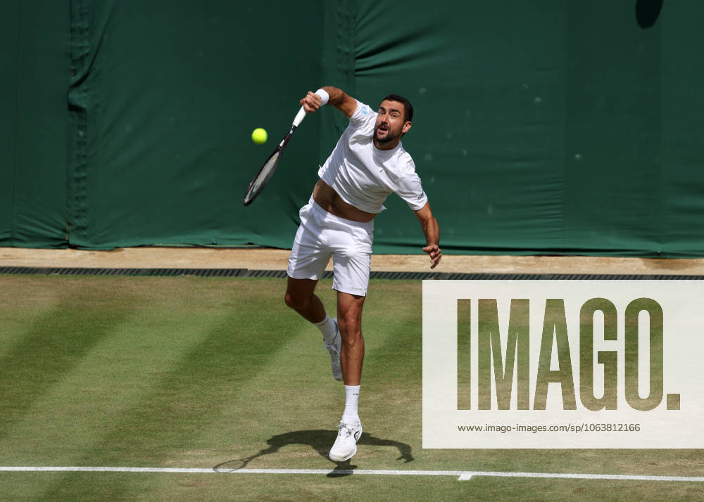 7th July 2025; All England Lawn Tennis and Croquet Club, London, England; Wimbledon Tennis Tournament, Day 8; Marin Cilic (CRO) serves to Flavio Cobolli (ITA) ActionPlus12811158 JohnxPatrickxFletcher