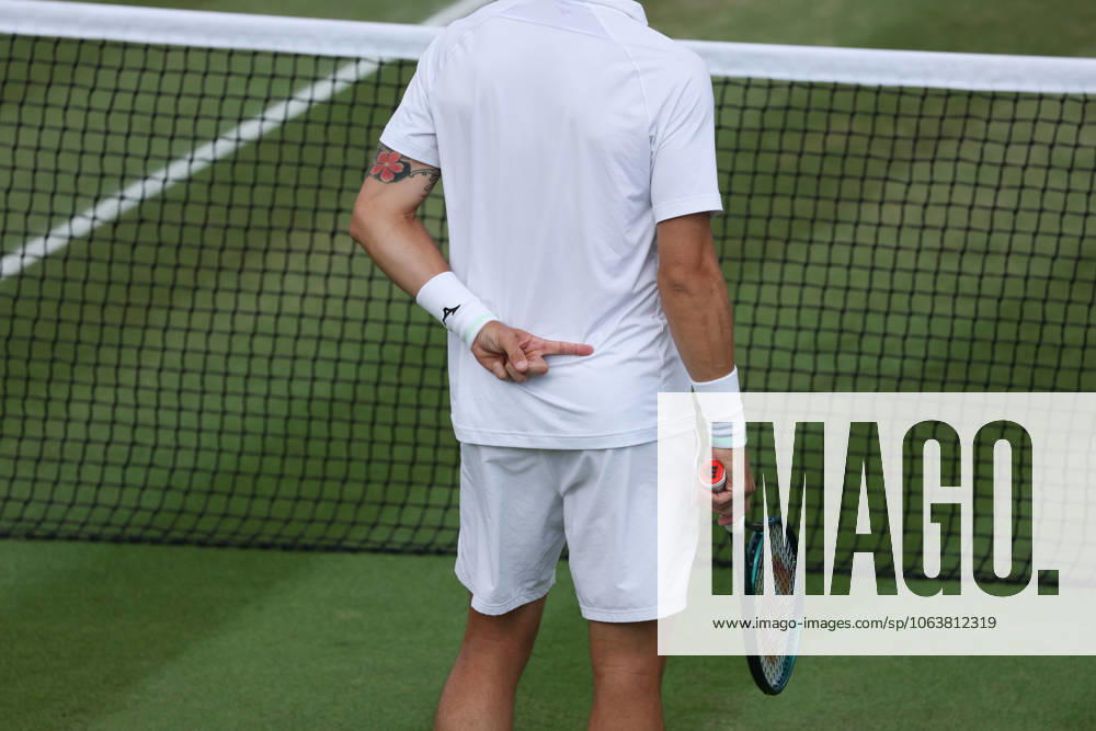 7th July 2025; All England Lawn Tennis and Croquet Club, London, England; Wimbledon Tennis Tournament, Day 8; Guido Andreozzi (ARG) sifnals serving options to Marcelo Demoliner (BRA) ActionPlus12811170 JohnxPatrickxFletcher