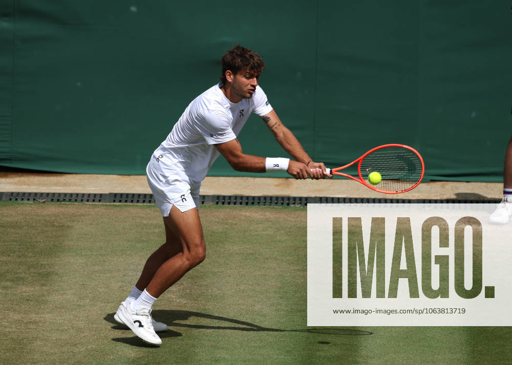7th July 2025; All England Lawn Tennis and Croquet Club, London, England; Wimbledon Tennis Tournament, Day 8; Flavio Cobolli (ITA) with a backhand shot to Marin Cilic (CRO) ActionPlus12811195 JohnxPatrickxFletcher