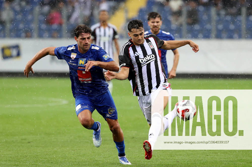 Besiktas vs St. Polten - Friendly match ST. POLTEN, AUSTRIA - JULY 10: St. Polten midfielder Leomend Krasniqi (L) and Besiktas player Mustafa Erhan Hekimoglu (R) compete for the ball during a pre-season friendly match between St. Polten and Besiktas at NV Arena in St. Polten, Austria, on July 10, 2025. Ahmet Okatali Anadolu Polten Austria. Editorial use only. Please get in touch for any other usage.