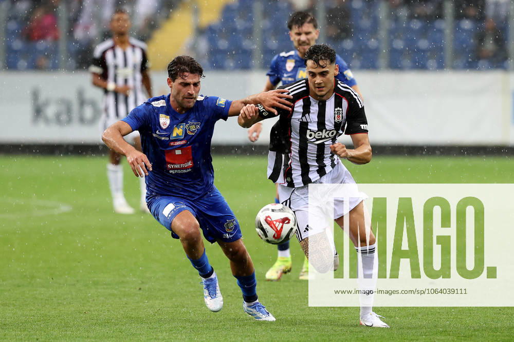 Besiktas vs St. Polten - Friendly match ST. POLTEN, AUSTRIA - JULY 10: St. Polten midfielder Leomend Krasniqi (L) and Besiktas player Mustafa Erhan Hekimoglu (R) compete for the ball during a pre-season friendly match between St. Polten and Besiktas at NV Arena in St. Polten, Austria, on July 10, 2025. Ahmet Okatali Anadolu Polten Austria. Editorial use only. Please get in touch for any other usage.