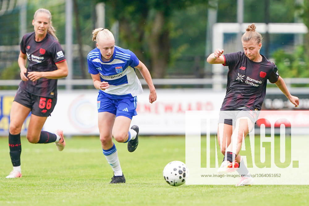 2025-07-11 PEC Zwolle Women v Bayer Leverkusen Women - Pre-season friendly WEZEP, NETHERLANDS - JULY 11: Lyanne Iedema of PEC Zwolle, Kristin Kogel of Bayer Leverkusen 04 during the Pre-season friendly match between PEC Zwolle Women and Bayer Leverkusen Women at Sportpark Mulderssingel on July 11, 2025 in Wezep, Netherlands. Wezep Sportpark Mulderssingel Netherlands Content not available for redistribution in The Netherlands directly or indirectly through any third parties.