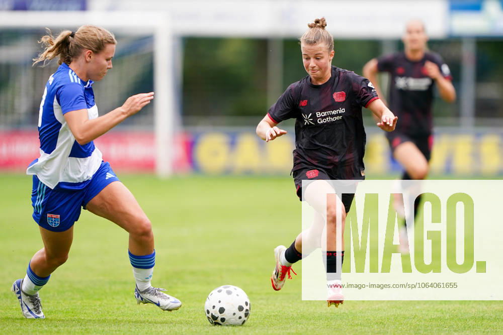 2025-07-11 PEC Zwolle Women v Bayer Leverkusen Women - Pre-season friendly WEZEP, NETHERLANDS - JULY 11: Inske Weiman of PEC Zwolle, Kristin Kogel of Bayer Leverkusen 04 during the Pre-season friendly match between PEC Zwolle Women and Bayer Leverkusen Women at Sportpark Mulderssingel on July 11, 2025 in Wezep, Netherlands. Wezep Sportpark Mulderssingel Netherlands Content not available for redistribution in The Netherlands directly or indirectly through any third parties.