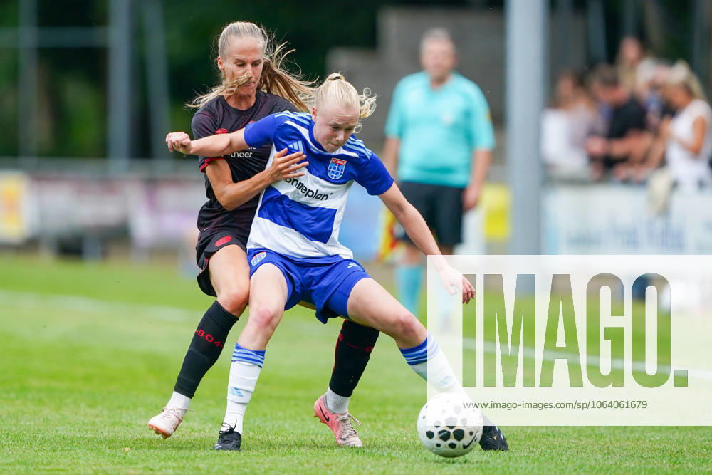 2025-07-11 PEC Zwolle Women v Bayer Leverkusen Women - Pre-season friendly WEZEP, NETHERLANDS - JULY 11: Juliette Vidal of Bayer Leverkusen 04, Lyanne Iedema of PEC Zwolle during the Pre-season friendly match between PEC Zwolle Women and Bayer Leverkusen Women at Sportpark Mulderssingel on July 11, 2025 in Wezep, Netherlands. Wezep Sportpark Mulderssingel Netherlands Content not available for redistribution in The Netherlands directly or indirectly through any third parties.
