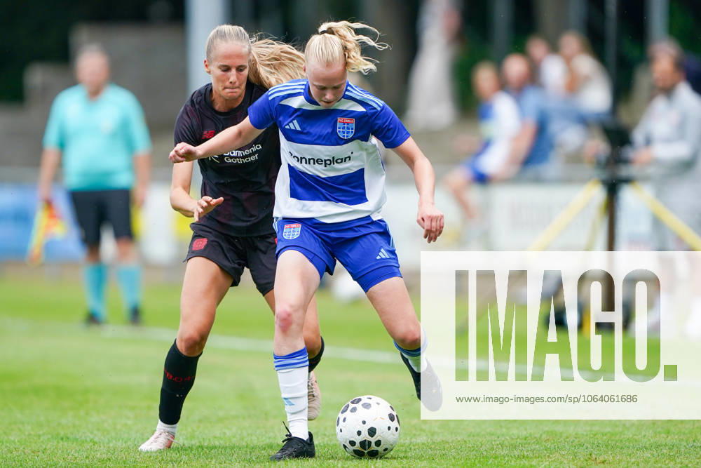 2025-07-11 PEC Zwolle Women v Bayer Leverkusen Women - Pre-season friendly WEZEP, NETHERLANDS - JULY 11: Juliette Vidal of Bayer Leverkusen 04, Lyanne Iedema of PEC Zwolle during the Pre-season friendly match between PEC Zwolle Women and Bayer Leverkusen Women at Sportpark Mulderssingel on July 11, 2025 in Wezep, Netherlands. Wezep Sportpark Mulderssingel Netherlands Content not available for redistribution in The Netherlands directly or indirectly through any third parties.