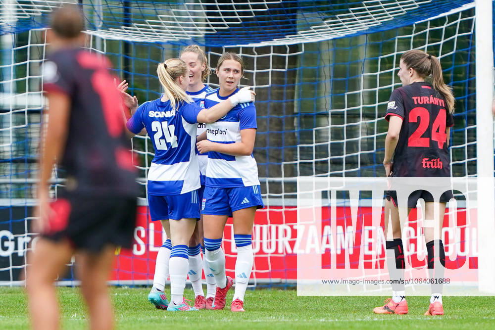 2025-07-11 PEC Zwolle Women v Bayer Leverkusen Women - Pre-season friendly WEZEP, NETHERLANDS - JULY 11: Senne van der Velde of PEC Zwolle, Ilvy Zijp of PEC Zwolle, Hanna Huizenga of PEC Zwolle celebrating a goal during the Pre-season friendly match between PEC Zwolle Women and Bayer Leverkusen Women at Sportpark Mulderssingel on July 11, 2025 in Wezep, Netherlands. Wezep Sportpark Mulderssingel Netherlands Content not available for redistribution in The Netherlands directly or indirectly through any third parties.
