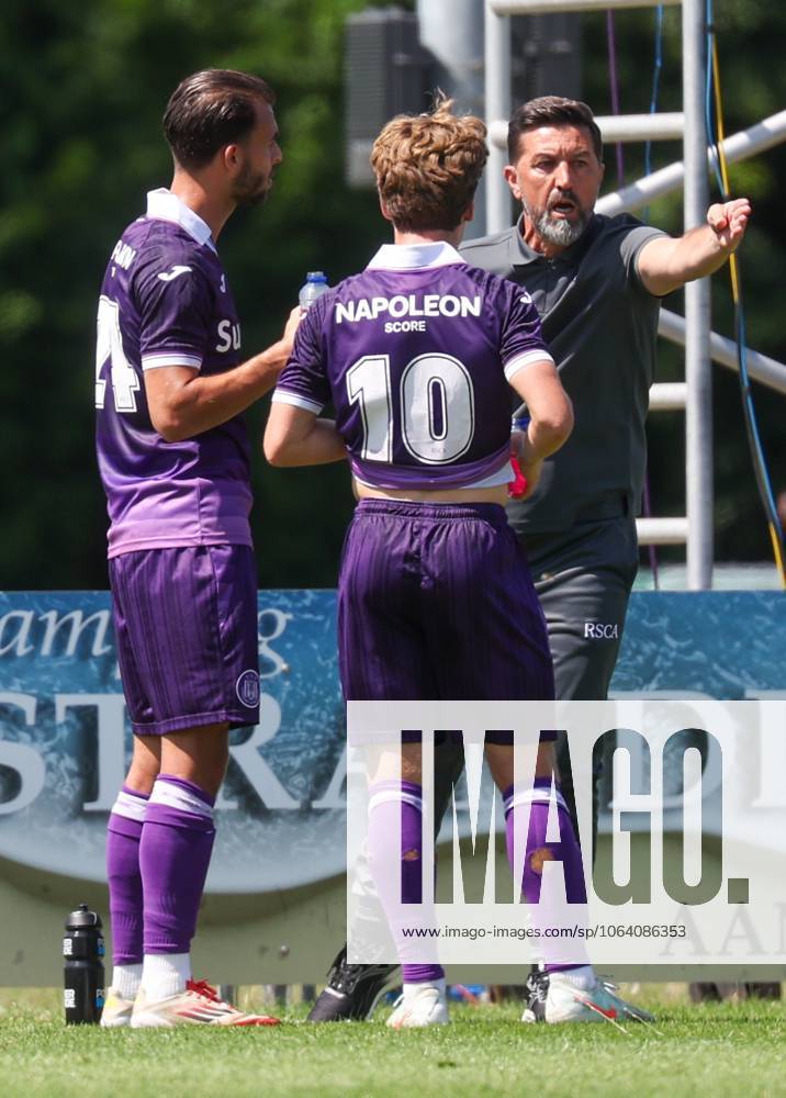 Anderlecht s Enric Llansana, Anderlecht s Yari Verschaeren and Anderlecht s head coach Besnik Hasi pictured during a friendly soccer game between Belgian soccer team RSC Anderlecht and Rakow Cz& 281;stochowa, during their summer camp in Renesse, the Netherlands on Saturday 12 July 2025. The team is preparing for the upcoming 2025-2026 first division season. VIRGINIExLEFOUR x128974155x