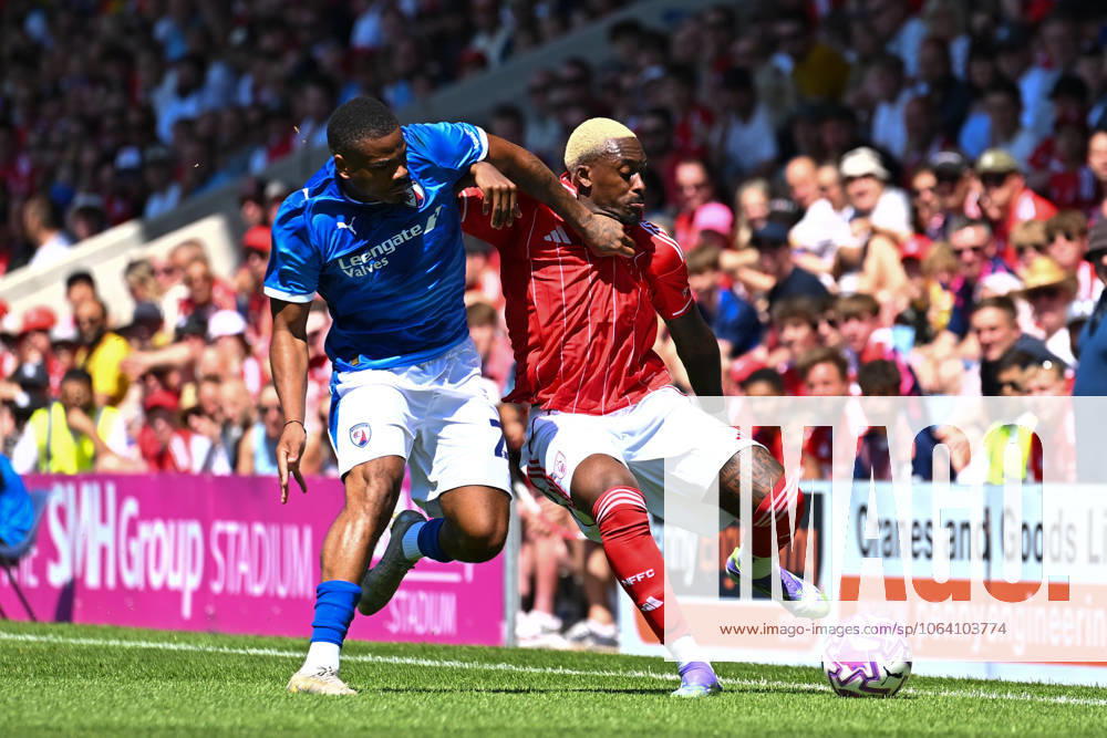 Chesterfield v Nottingham Forest - Pre-Season Friendly Callum Hudson-Odoi of Nottingham Forest battles with Vontae Daley-Campbell of Chesterfield during the pre-season friendly match between Chesterfield and Nottingham Forest at the SMH Group Stadium in Chesterfield, England, on July 12, 2025. Chesterfield Derbyshire United Kingdom