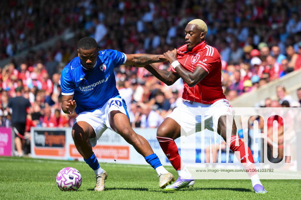Chesterfield v Nottingham Forest - Pre-Season Friendly Callum Hudson-Odoi of Nottingham Forest battles with Vontae Daley-Campbell of Chesterfield during the pre-season friendly match between Chesterfield and Nottingham Forest at the SMH Group Stadium in Chesterfield, England, on July 12, 2025. Chesterfield Derbyshire United Kingdom