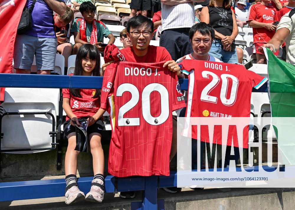Preston, England, 13th July 2025. Liverpool fans holding shirts in tribute of Liverpool player Diogo Jota ahead of the Preston North End vs Liverpool Pre Season Friendly match at Deepdale, Preston. Picture credit should read: Cody Froggatt Sportimage . SPI_014_CF_PRESTON_V_LIVERPOOL SPI-4018-0014
