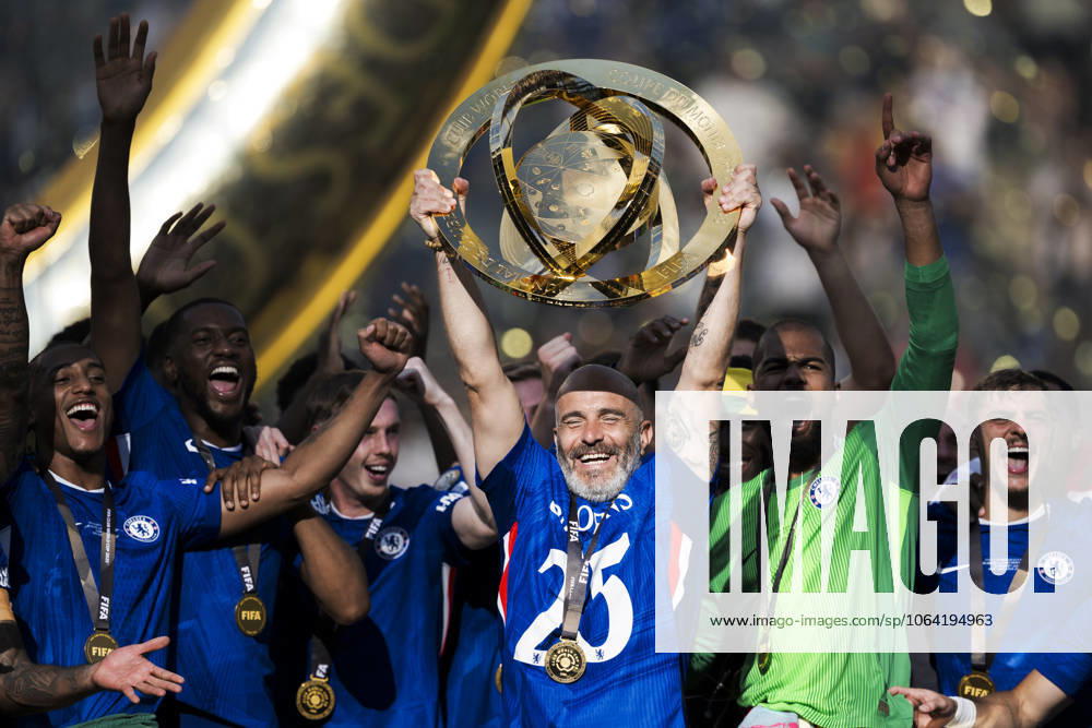 Chelsea FC v Paris Saint-Germain FC - FIFA Club World Cup Enzo Maresca, head coach of Chelsea FC, lifts the trophy during the award ceremony following the FIFA Club World Cup final football match between Chelsea FC and Paris Saint-Germain FC. East Rutherford United States