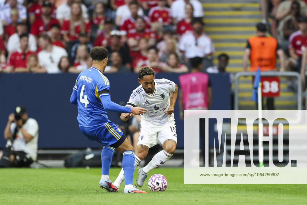 Manchester United, ManU FC v Leeds United FC, Pre-Season Friendly, Stockholm Manchester United forward Matheus Cunha (10) battles with Leeds United midfielder Ethan Ampadu (4) during the Manchester United FC v Leeds United FC Pre-Season Friendly match at the Strawberry Arena, Stockholm, Sweden on 19 July 2025 Credit: Phil Duncan Every Second Media Editorial use only. All images are copyright Every Second Media Limited. No images may be reproduced without prior permission.