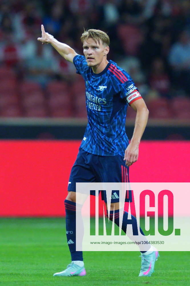 Arsenal FC V AC Milan - Pre-Season Friendly Match Martin Odegaard of Arsenal plays during the pre-season friendly match between Arsenal FC and AC Milan at National Stadium in Singapore on July 23, 2025. Singapore Singapore