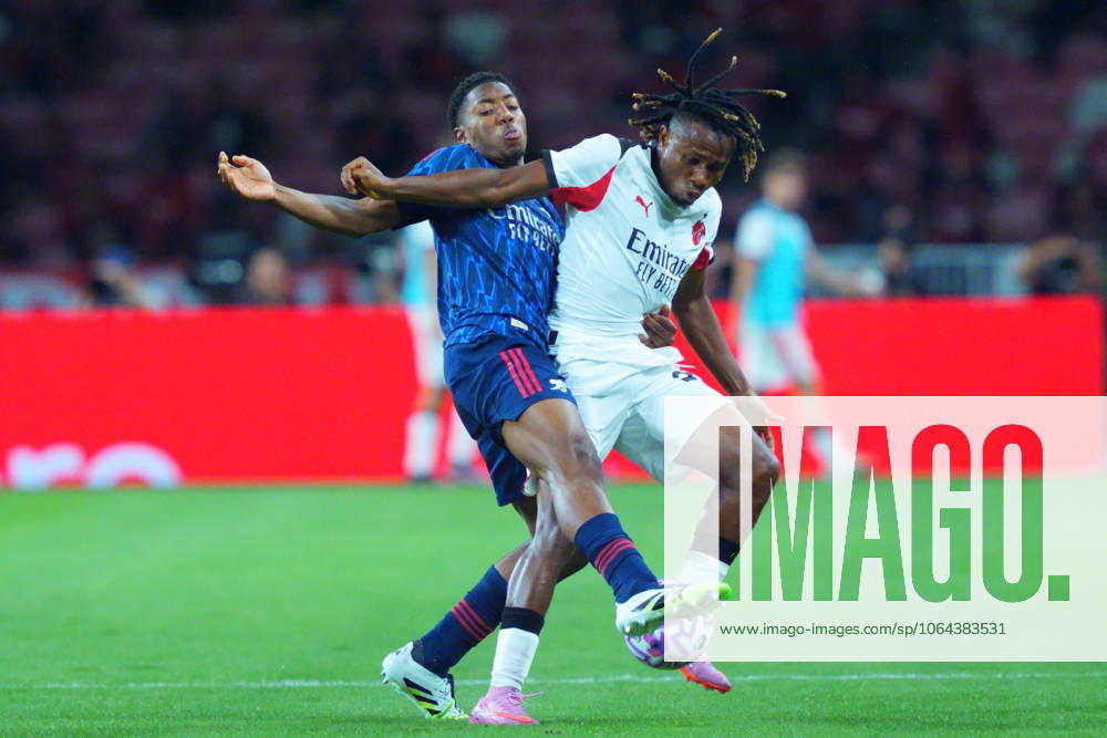 Arsenal FC V AC Milan - Pre-Season Friendly Match Myles Lewis-Skelly of Arsenal challenges Samuel Chukwueze of AC Milan during the pre-season friendly match between Arsenal FC and AC Milan at National Stadium in Singapore on July 23, 2025. Singapore Singapore