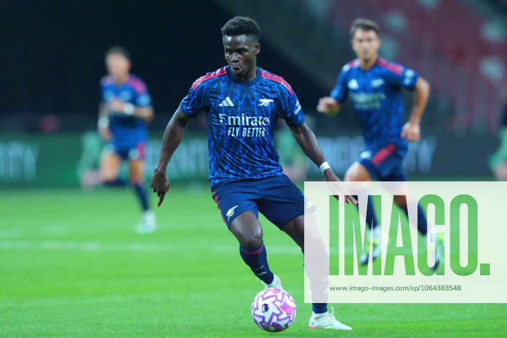 Arsenal FC V AC Milan - Pre-Season Friendly Match Bukayo Saka of Arsenal is in action during the pre-season friendly match between Arsenal FC and AC Milan at National Stadium in Singapore on July 23, 2025. Singapore Singapore