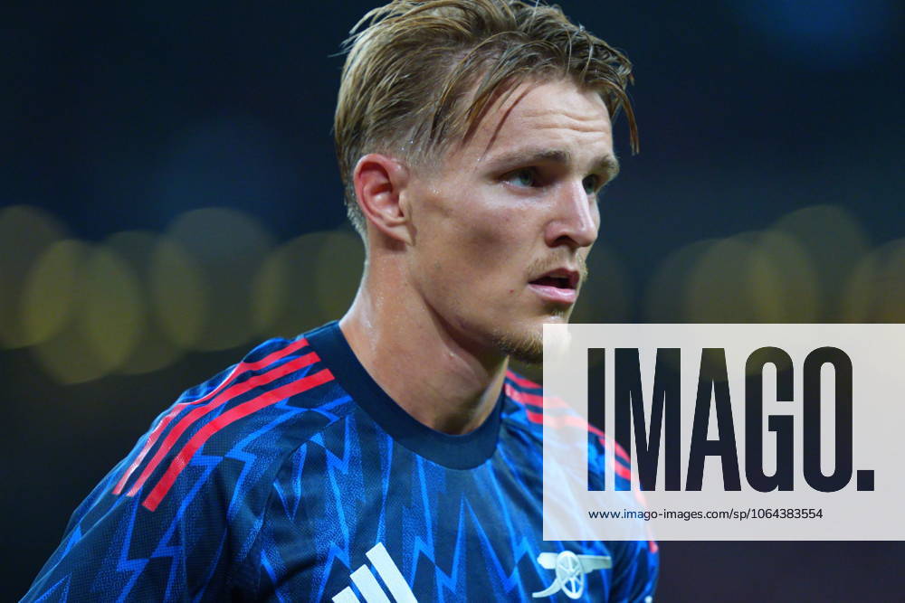 Arsenal FC V AC Milan - Pre-Season Friendly Match Martin Odegaard of Arsenal is in action during the pre-season friendly match between Arsenal FC and AC Milan at National Stadium in Singapore on July 23, 2025. Singapore Singapore