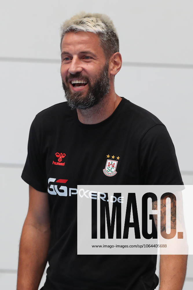 Handball, Daikin HBL, SC Magdeburg training kick-off 2025 26 v l Bennet Wiegert Magdeburg, coach portrait, portraet, single picture laugh laugh Magdeburg