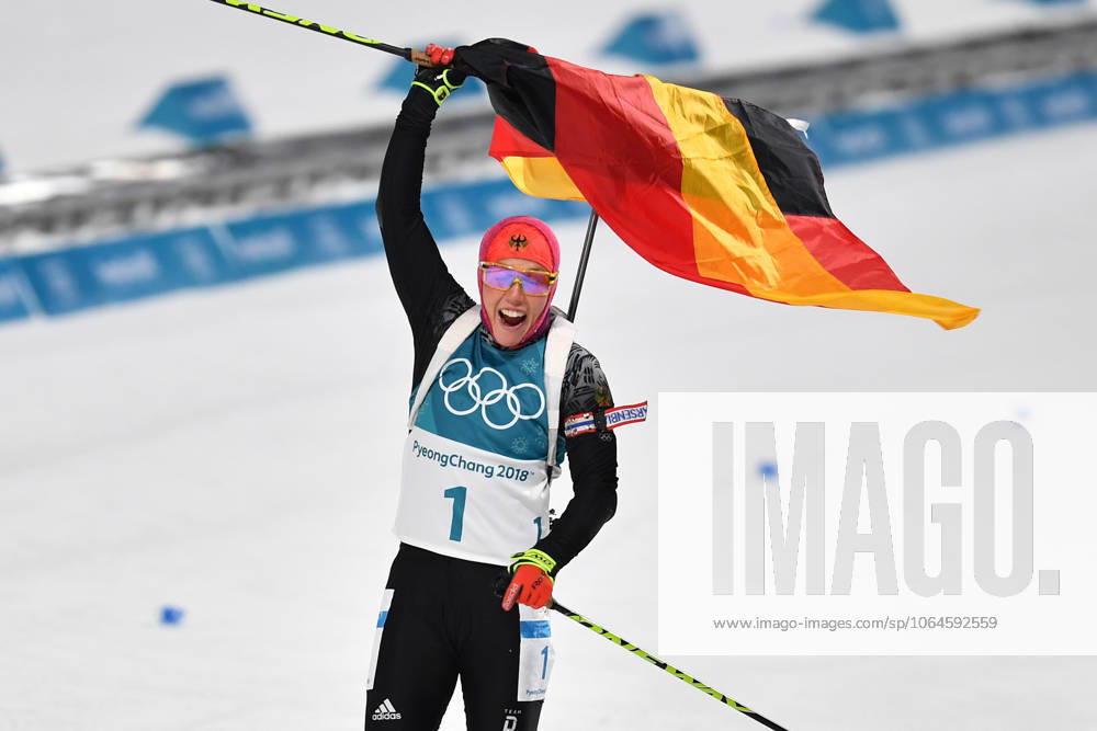 On the tragic death of Laura DAHLMEIER in a mountain accident in Pakistan ARCHIVE PHOTO Laura DAHLMEIER GER 1st place, gold medal winner, gold, gold medal, Olympic champion, at the finish line, finish line with the German flag, flag, cheers, cheers, joy, enthusiasm, emotion, cheer, cheers, action cross-country skiing, biathlon, women s 10 km pursuit 10 km women s pursuit on 12 02 2018 Olympic Winter Games 2018, from 09 02 25 02 2018 in PyeongChang South Korea Â