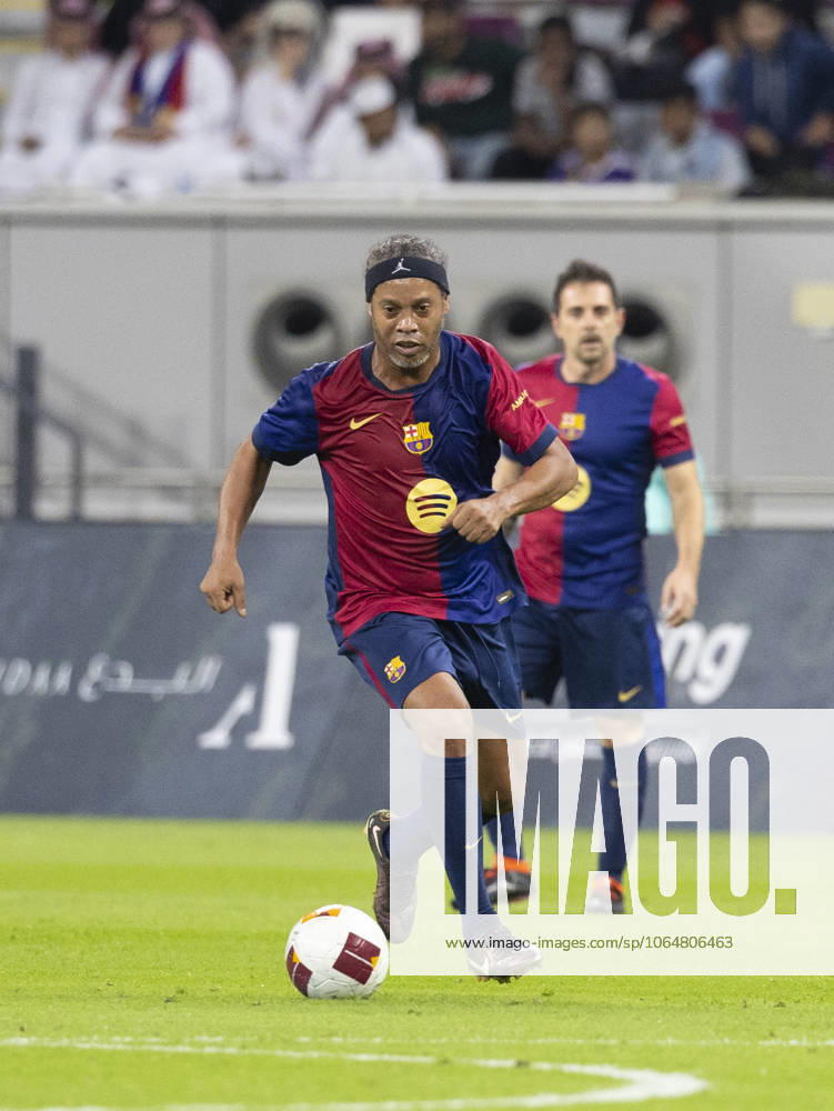 Legends of El Clasico: Real Madrid v Barcelona DOHA, QATAR - NOV 28: Barcelona s legend Ronaldinho competes in the Legends El Clasico football match between Real Madrid and Barcelona at the Khalifa International Stadium in Doha, Qatar on November 28, 2024. Doha Qatar. Editorial use only. Please get in touch for any other usage.