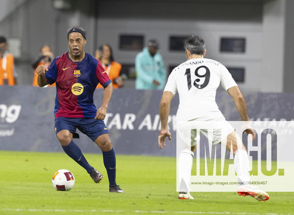 Legends of El Clasico: Real Madrid v Barcelona DOHA, QATAR - NOV 28: Barcelona s legend Ronaldinho competes in the Legends El Clasico football match between Real Madrid and Barcelona at the Khalifa International Stadium in Doha, Qatar on November 28, 2024. Doha Qatar. Editorial use only. Please get in touch for any other usage.