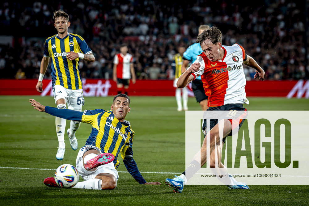 Fenerbahce SK defender Mert Muldur, Feyenoord Rotterdam forwarder Leo Sauer during the match Feyenoord Fenerbahce at the Kuip Stadium for the third qualifying round champions league season 2025 2026 in Rotterdam, Netherlands on 6 august 2025, photo by Marcel van Dorst EYE4images DeFodi Images