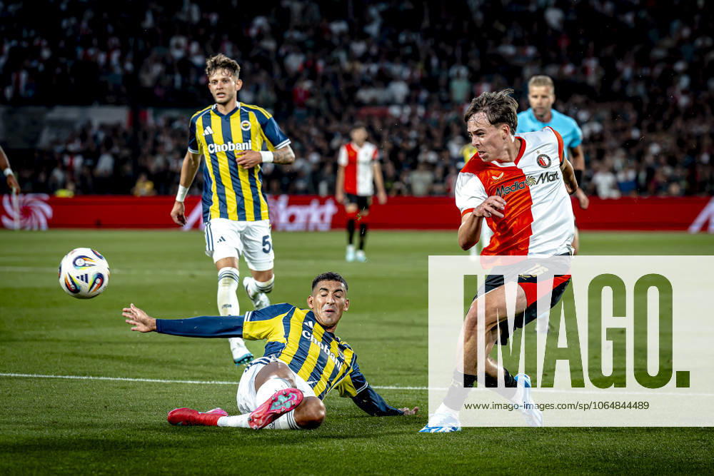 Fenerbahce SK defender Mert Muldur, Feyenoord Rotterdam forwarder Leo Sauer during the match Feyenoord Fenerbahce at the Kuip Stadium for the third qualifying round champions league season 2025 2026 in Rotterdam, Netherlands on 6 august 2025, photo by Marcel van Dorst EYE4images DeFodi Images
