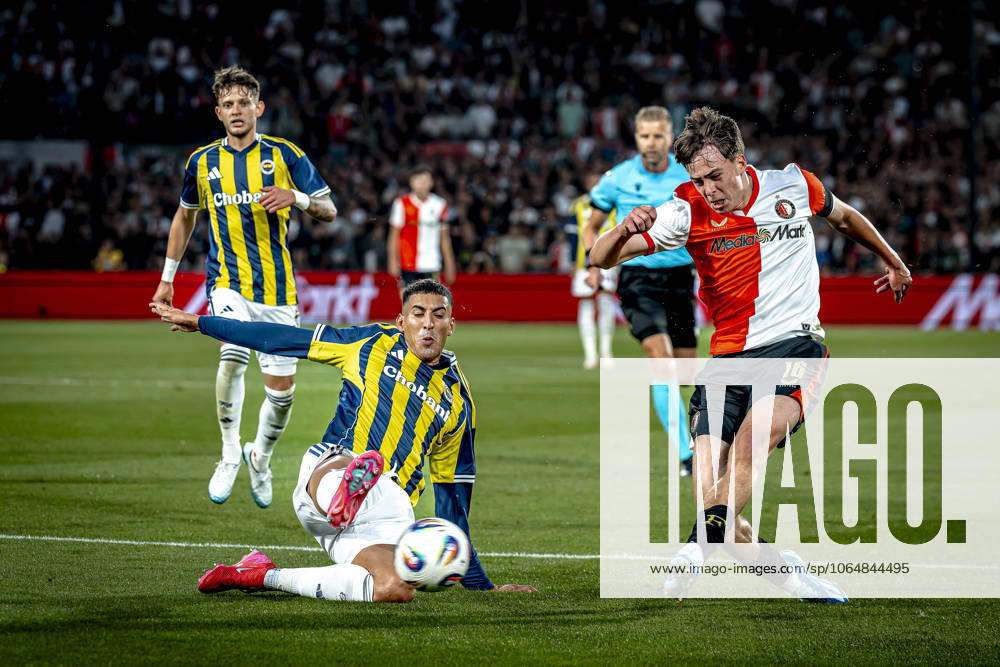 Fenerbahce SK defender Mert Muldur, Feyenoord Rotterdam forwarder Leo Sauer during the match Feyenoord Fenerbahce at the Kuip Stadium for the third qualifying round champions league season 2025 2026 in Rotterdam, Netherlands on 6 august 2025, photo by Marcel van Dorst EYE4images DeFodi Images