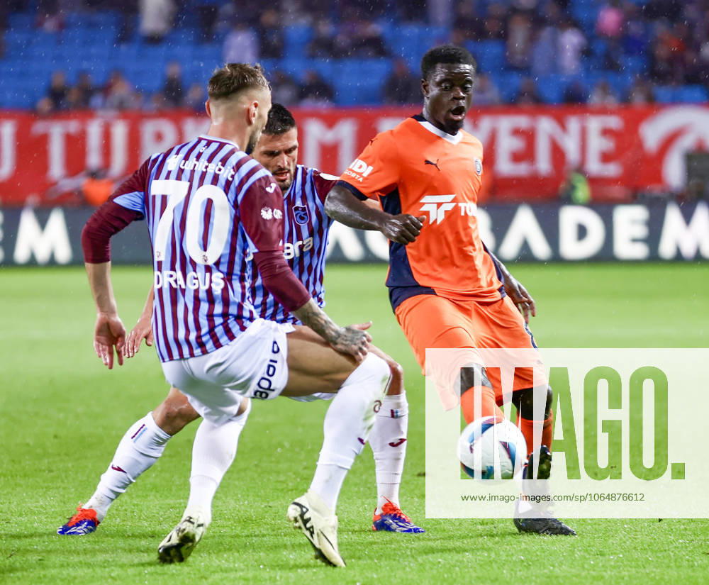 Trabzonspor v Basaksehir - Turkish Super Lig TRABZON, TURKIYE - OCTOBER 19: Olivier Kemen (R) of Basaksehir in action during the Turkish Super Lig week 9th match between Trabzonspor and Basaksehir at Papara Park in Trabzon, Turkiye on October 19, 2024. Trabzon Turkey. Editorial use only. Please get in touch for any other usage.