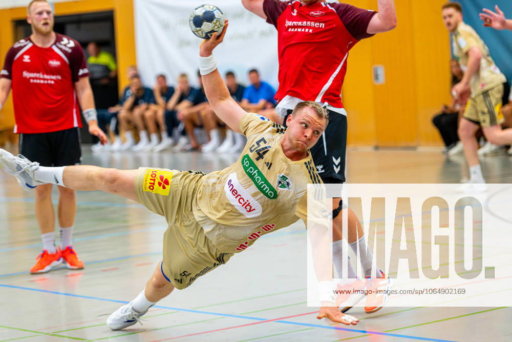 Justus Fischer TSV Hannover Burgdorf, No 54 v l , TSV Hannover Burgdorf beige against Aalborg Handbold red on matchday 1 of the International Heide Cup 08 08 2025, Schneverdingen, GER ,