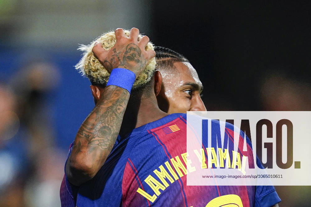 ESP: FC Barcelona, Barca v Como 1907. Joan Gamper Trophy Lamine Yamal of FC Barcelona celebrates the 4-0 with Raphael Dias Belloli Raphinha during the Joian Gaper Trophy match between FC Barcelona and Como 1907 played at Johan Cruyff Stadium on August 10, 2025 in Barcelona, Spain. kpng