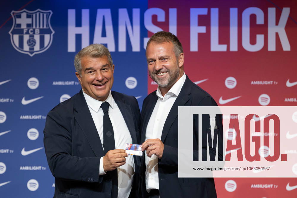 FC Barcelona, Barca presents its new head coach Hansi Flick in Spain BARCELONA, SPAIN - JULY 25: FC Barcelona President Joan Laporta (2nd L) and Barcelona s new German coach Hansi Flick (2nd R) pose for a photo as they attend a ceremony to present new coach of FC Barcelona at the Camp Nou Stadium in Barcelona on July 25, 2024. Spain World. Editorial use only. Please get in touch for any other usage.