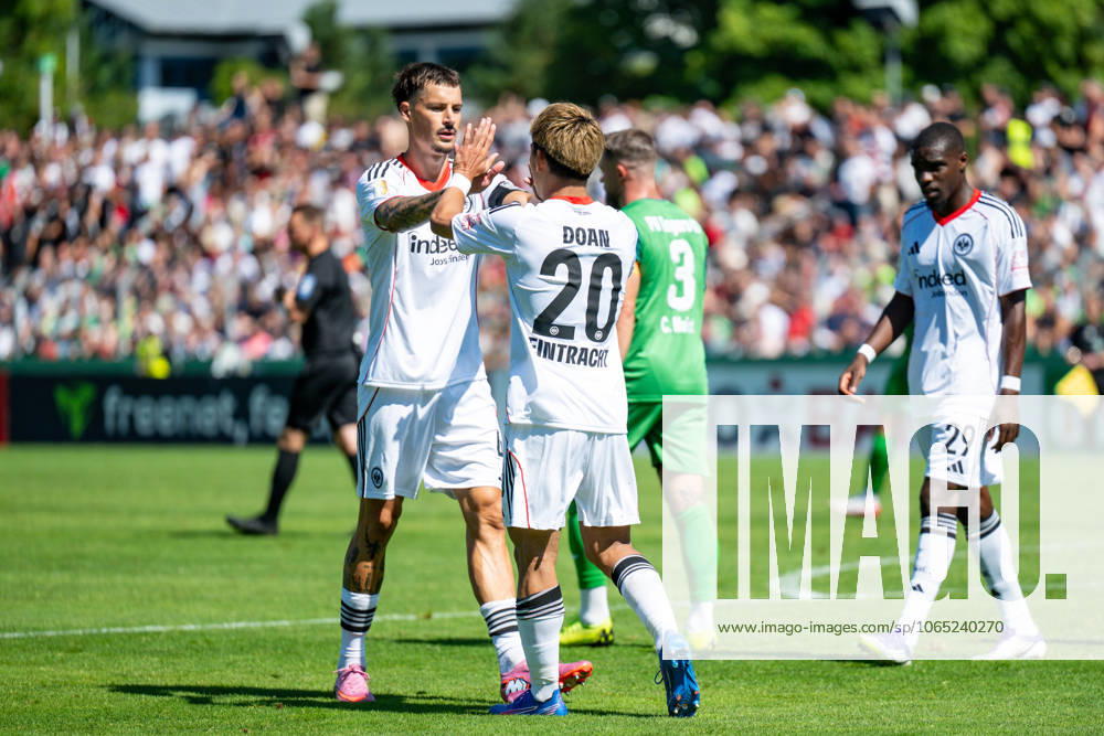 Ritsu Doan Frankfurt, 20 and Robin Koch Frankfurt 4 celebrate the goal for 0 3, GER, FV Engers 07 vs Eintracht Frankfurt, Football Men DFB Pokal, 1 round, Season 2025 2026, 17 08 2025 DFB regulations prohibit any use of photographs as image sequences and or quasi video GER, FV Engers 07 vs Eintracht Frankfurt, Football Men DFB Pokal, 1 round, Season 2025 2026, 17 08 2025 Engers