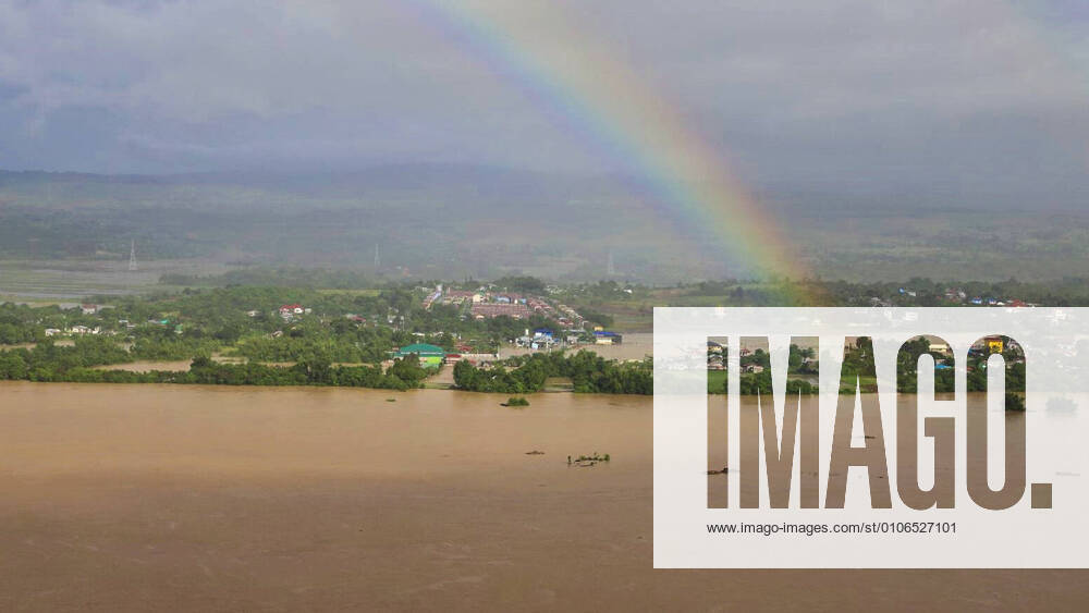 (201114) -- CAGAYAN, Nov. 14, 2020 -- A rainbow is seen over houses that are submerged in the flood caused by Typhoon Vamco in Cagayan Province, the Philippines, Nov. 14, 2020. The death toll from Typhoon Vamco that battered the Philippines this week has climbed to 53, the Philippine National Police (PNP) said on Saturday. ( Handout via Xinhua) PHILIPPINES-CAGAYAN-TYPHOON VAMCO-FLOOD ThexPhilippinexCoastxGuard