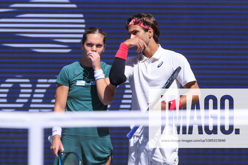 Caty McNally and Lorenzo Musetti talk strategy during a mix doubles match against Naomi Osaka and Gael Monfils at the 2025 US Open at USTA Billie Jean King National Tennis Center on Tuesday August 19, 2025 in the Flushing neighborhood of the Queens borough of New York City. JAVIER ROJAS PI Flushing Meadows USA - ZUMAp124 20250819_zaa_p124_003