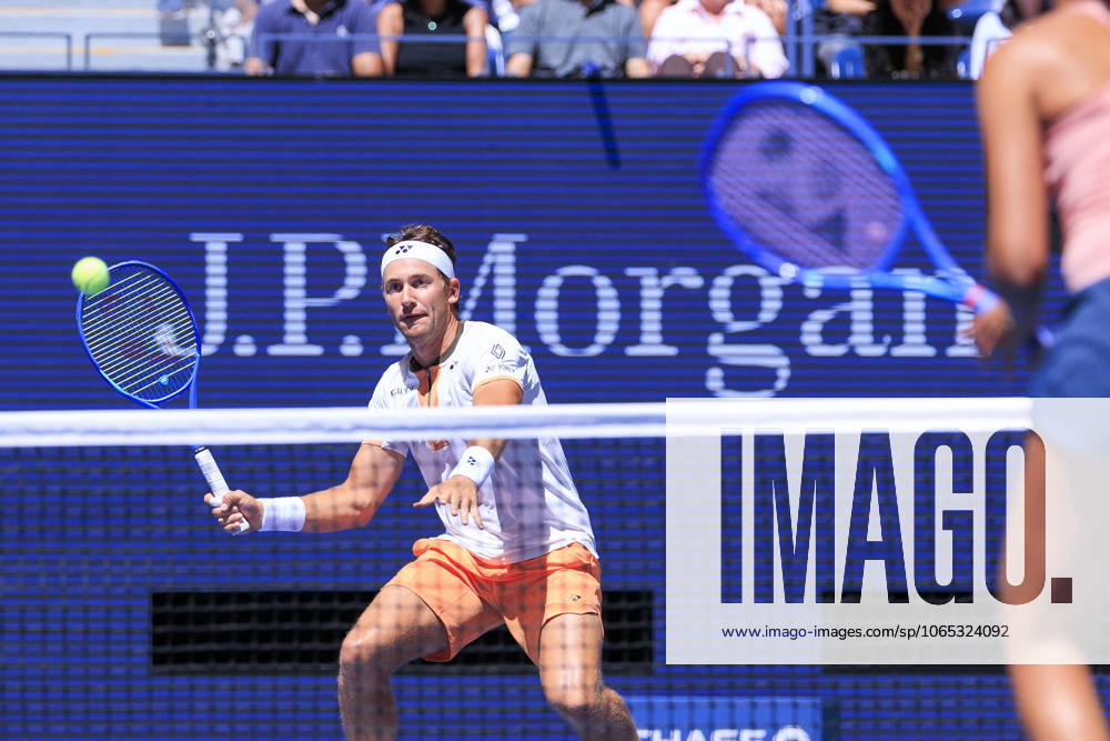 Iga Swiatek and Casper Ruud (in photo) volleys during a mix doubles match against Madison Keys and Frances Tiafoe at the 2025 US Open at USTA Billie Jean King National Tennis Center on Tuesday August 19, 2025 in the Flushing neighborhood of the Queens borough of New York City. JAVIER ROJAS PI Flushing Meadows USA - ZUMAp124 20250819_zaa_p124_045