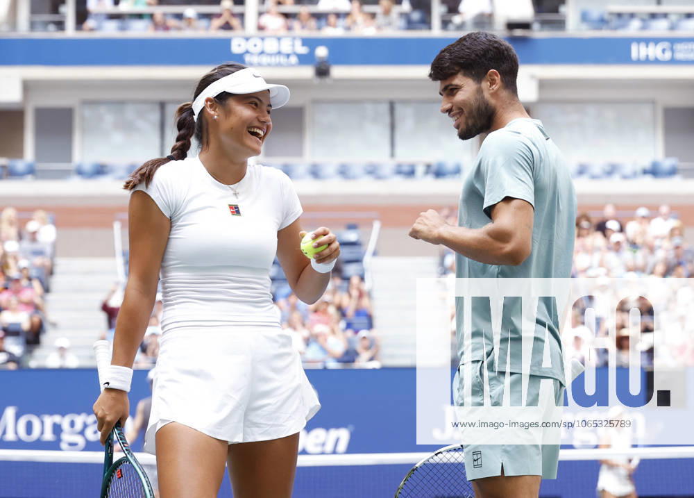 Emma Raducanu of Great Britain and Carlos Alcaraz of Spain celebrate after a point in their round one match against Jessica Pegula and Jack Draper of Great Britain in the mixed doubles championships in Arthur Ashe Stadium at the 2025 US Open Tennis Championship at the USTA Billie Jean King National Tennis Center in New York City on Tuesday, August 19, 2025 in New York City. Jessica Pegula and Jack Draper of Great Britain defeated Emma Raducanu of Great Britain and Carlos Alcaraz of Spain 4-2, 4-2 and advance to the quarterfinals. NYP20250819104 JOHNxANGELILLO